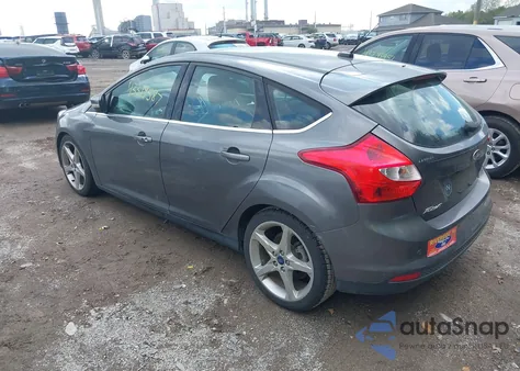 2012 Ford Focus Titanium z USA, uszkodzony, nr VIN 1FAHP3N29CL365618